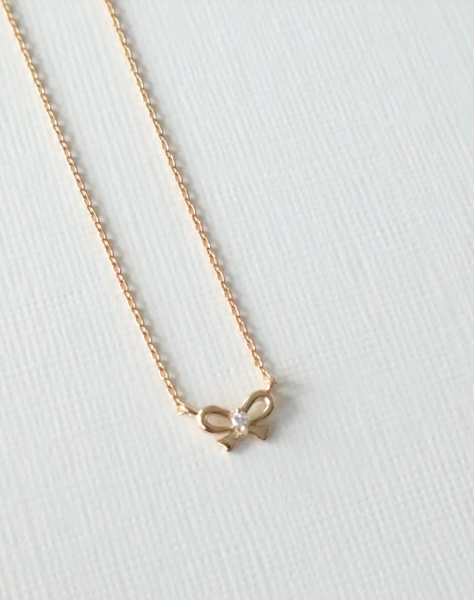 BABY BOW NECKLACE GOLD